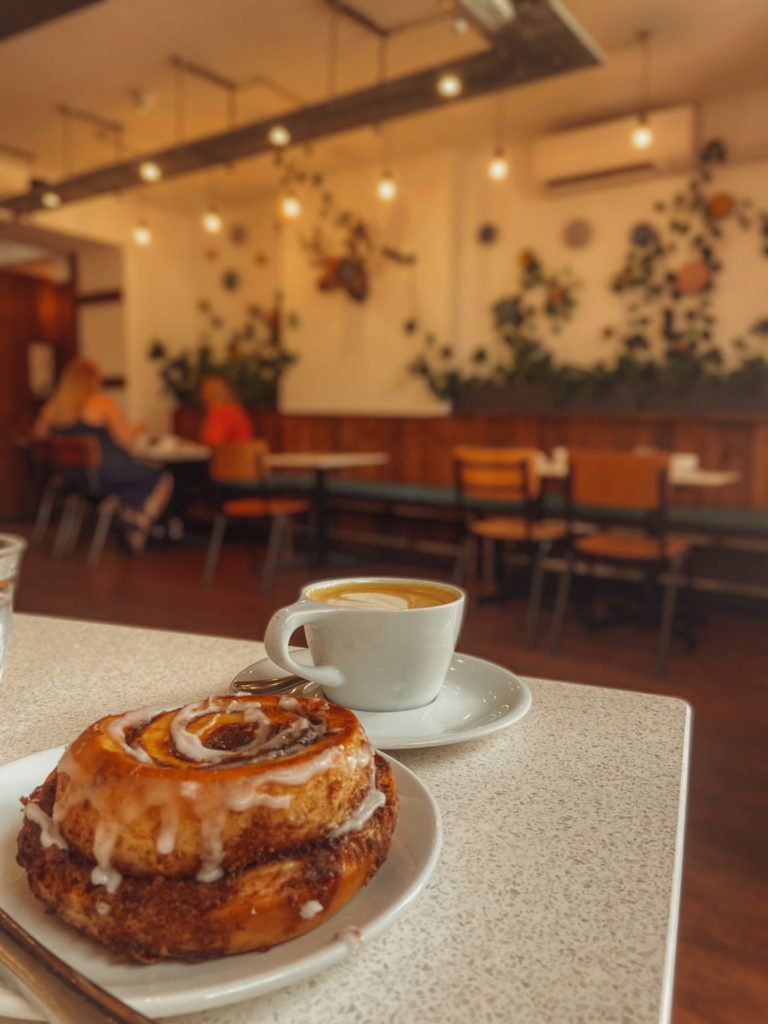 coffee and cinnamon bun at balterzens cafe harrogate