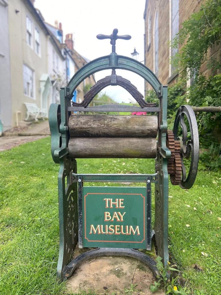 robin hoods bay museum sign